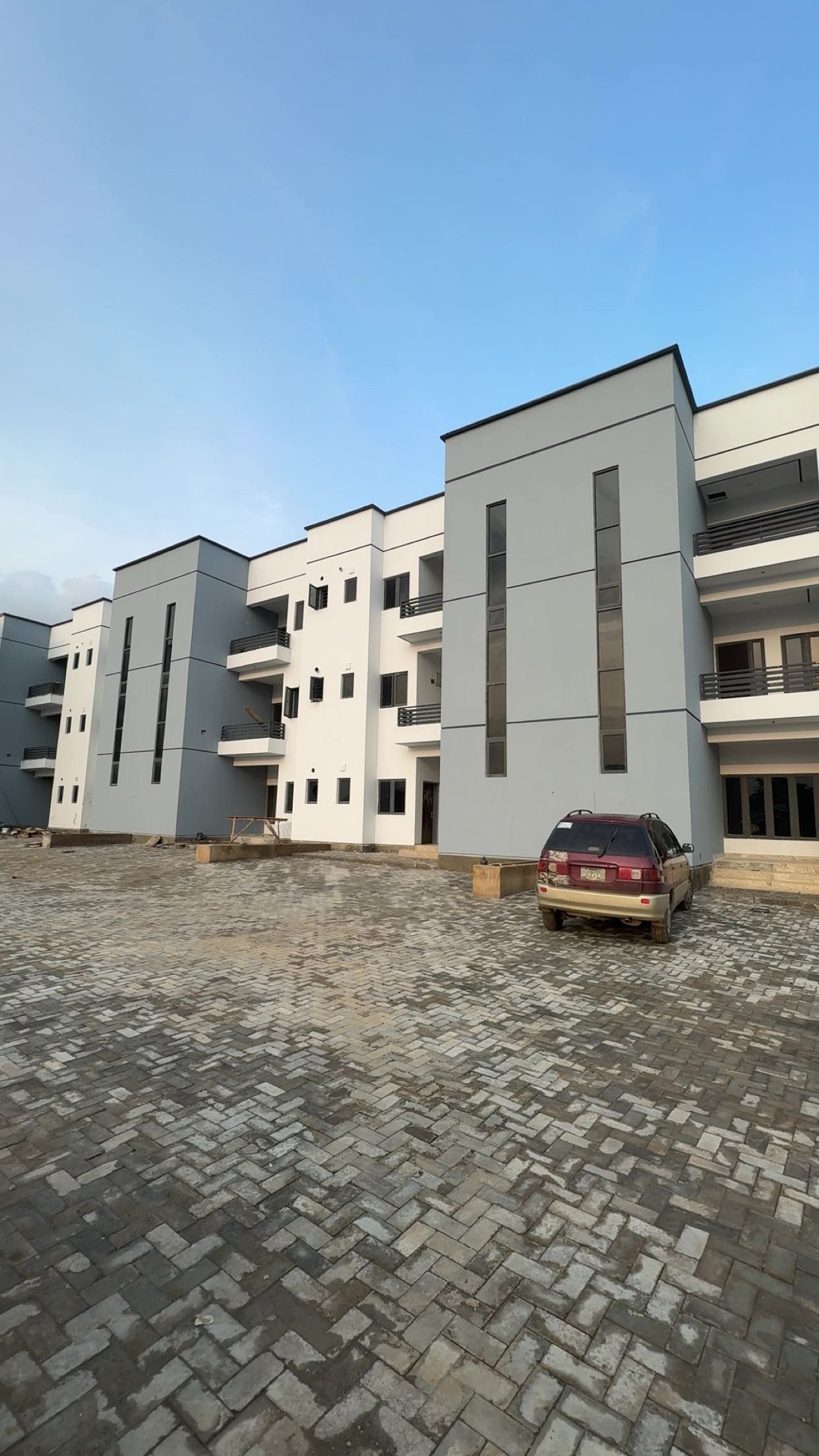 A second street of completed blocks at Belleville Estate