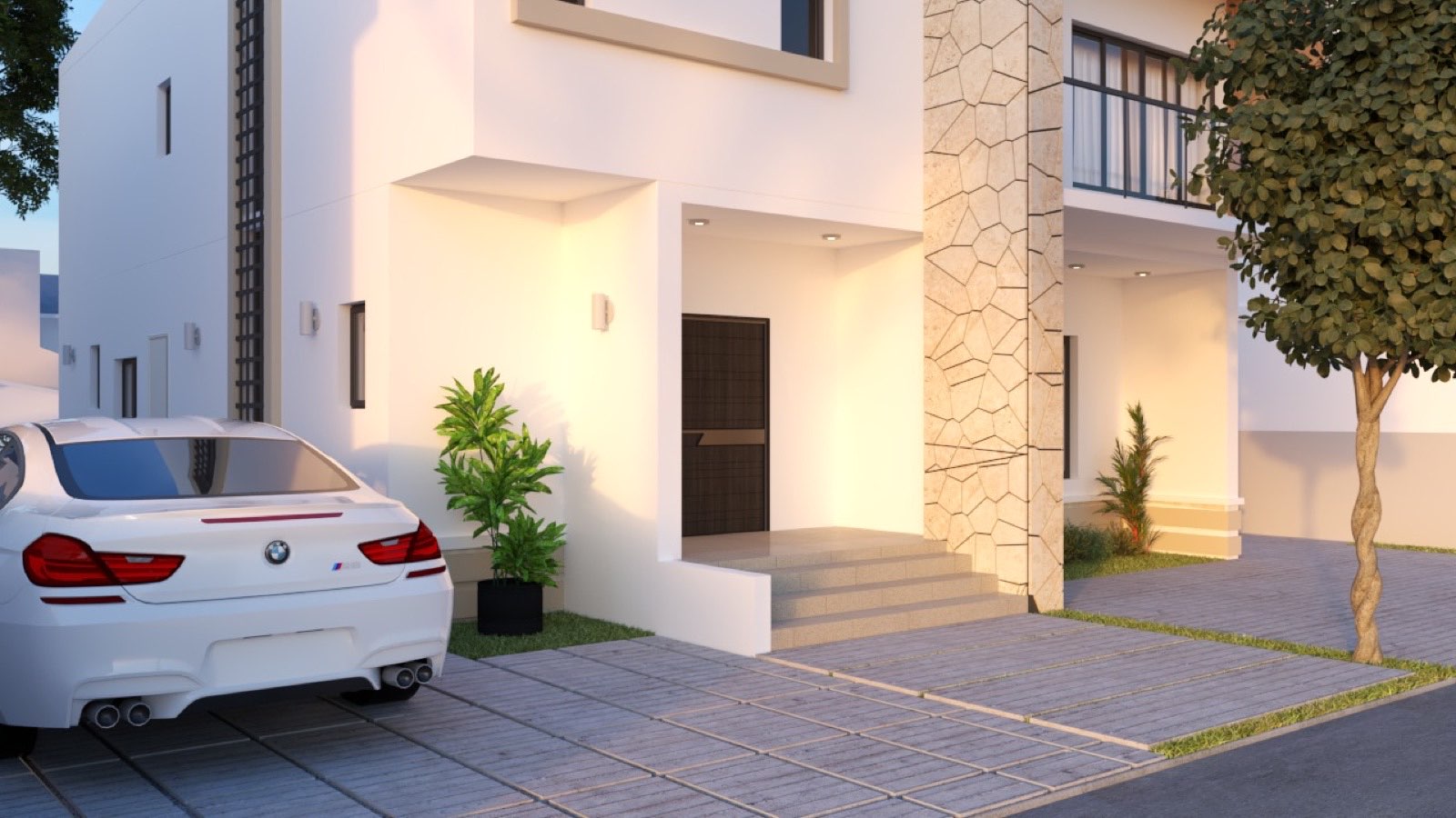 Paved entrance courtyard of a refurbished home at Wiser Court